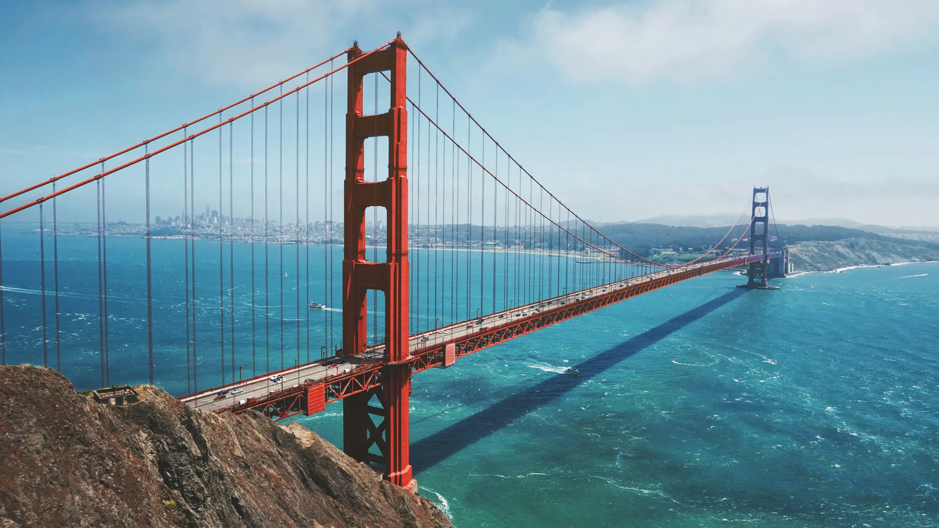The Golden Gate Bridge in San Francisco with fog rolling over the Marin Headlands